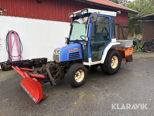 Traktor Iseki 321 med plog och spridare