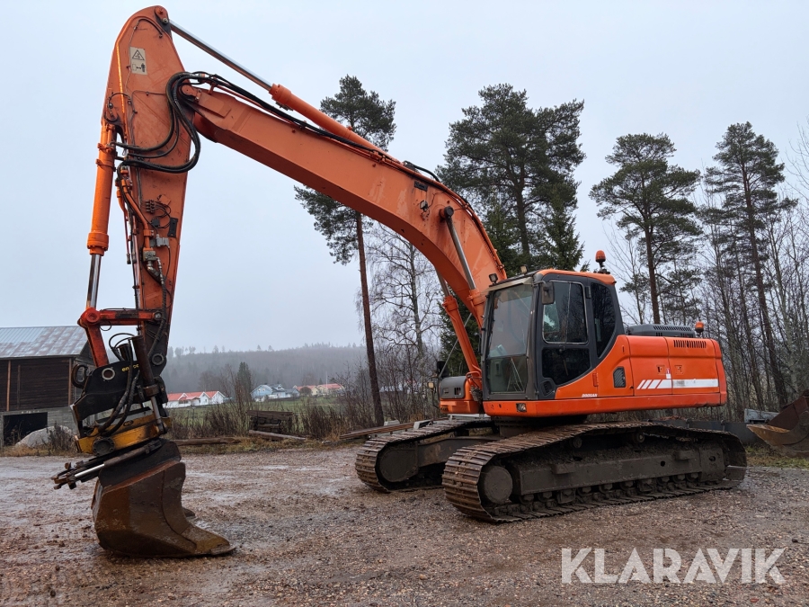 Grävmaskin Doosan DX255LC med Planeringsskopa