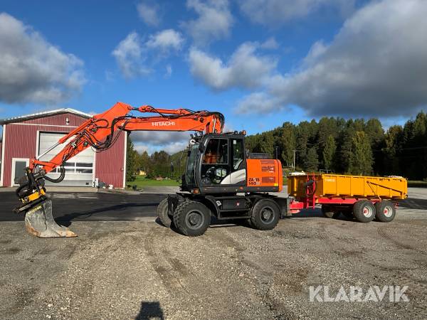 Grävmaskin Hitachi ZX 140W-5B med redskap och vagn
