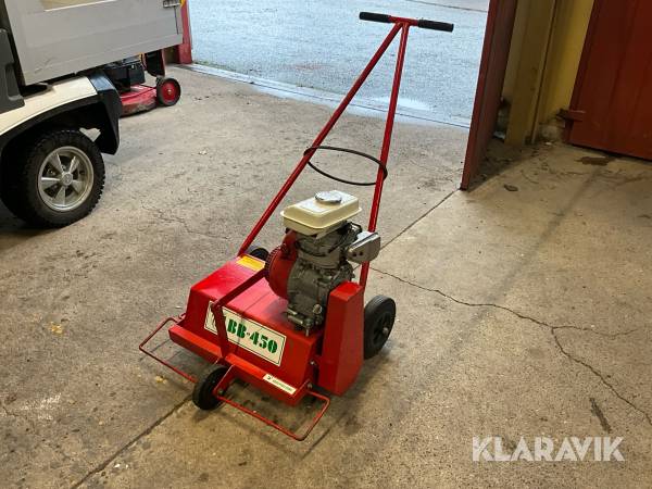 Bensindriven Vertikalskätare/Gräsmattevårdare Honda