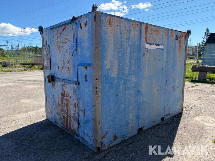 Container med hyllor och arbetsbänk