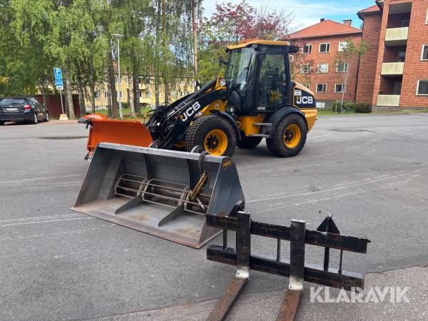 Hjullastare JCB 409B med redskap