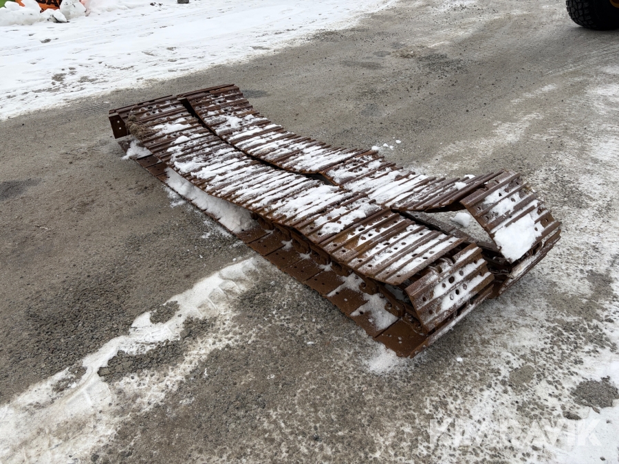 Band till grävmaskin