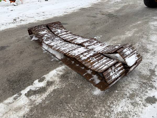 Band till grävmaskin