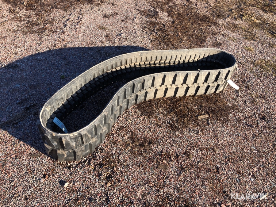 Larvband till grävmaskin