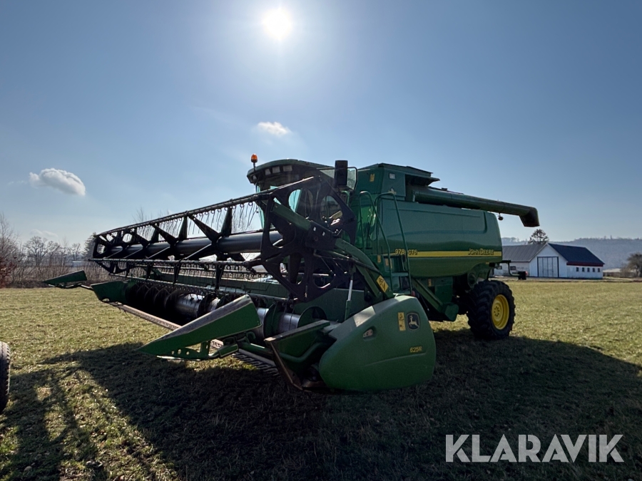 Skördetröska John Deere 9780 CTS med Skärbordsvagn
