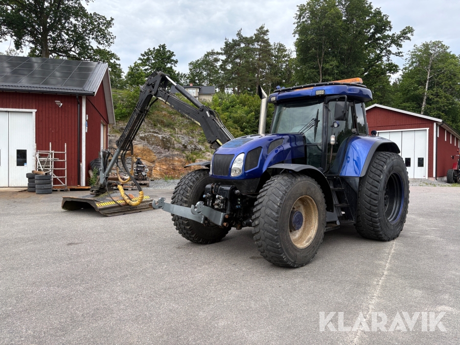 Traktor New Holland T7550 med Slagkraft armklippare