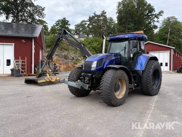 Traktor New Holland T7550 med Slagkraft armklippare