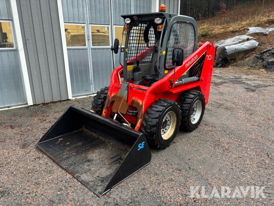 Kompaktlastare Neuson 701S skopa+gafflar