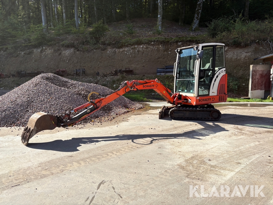 Grävmaskin Schaeff HR12 med hydraulisk sticka och 4 st verktyg