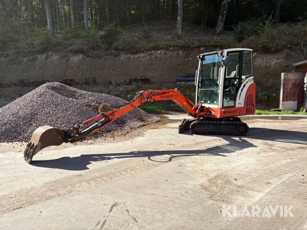 Grävmaskin Schaeff HR12 med hydraulisk sticka och 4 st verktyg