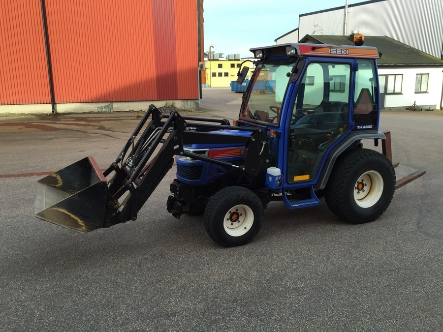 Kompakttraktor med tillbehör