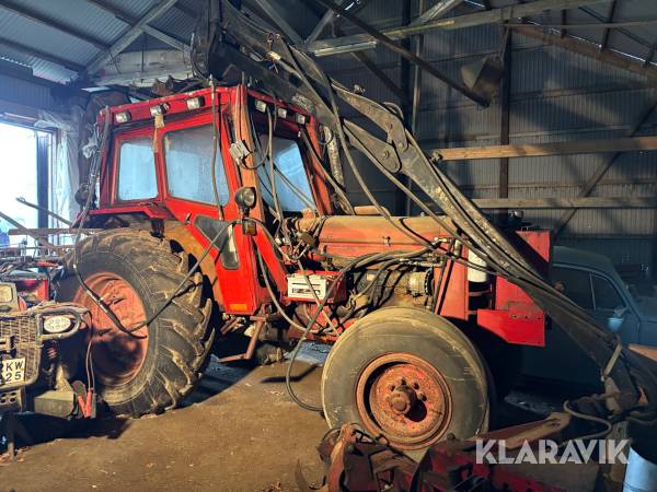 Veterantraktor Bison BM 370 med Mowi kran och skördaraggregat