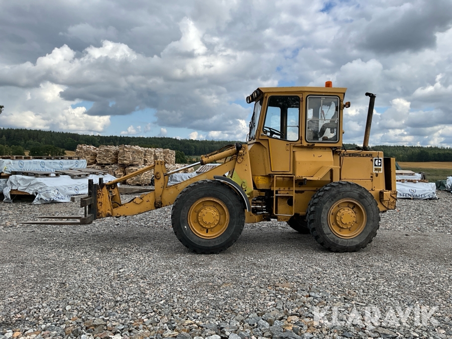 Hjullastare CAT 910 80U med gafflar och skopa