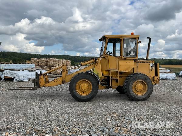 Hjullastare CAT 910 80U med gafflar och skopa