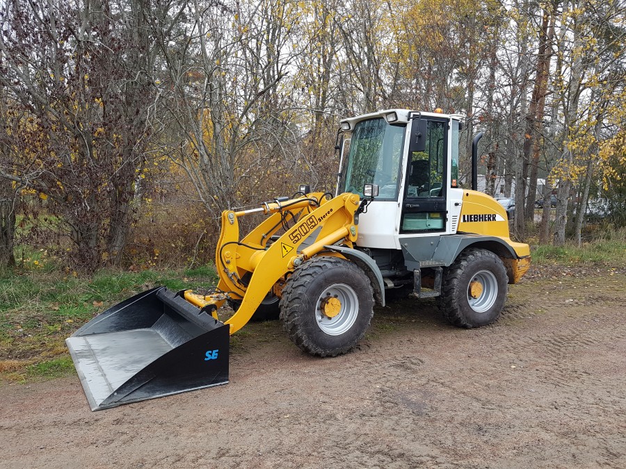 LASTMASKIN HJULLASTARE MED REDSKAP