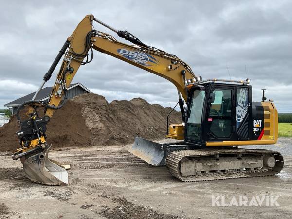 Grävmaskin CAT 313FL med grävsystem, tiltrotator och skopor
