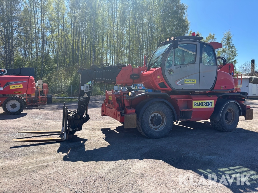 Teleskoptruck runtomsvängande Manitou MRT 1850 med pallgafflar