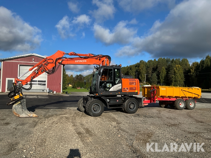 Grävmaskin Hitachi ZX 140W-5B med redskap och vagn
