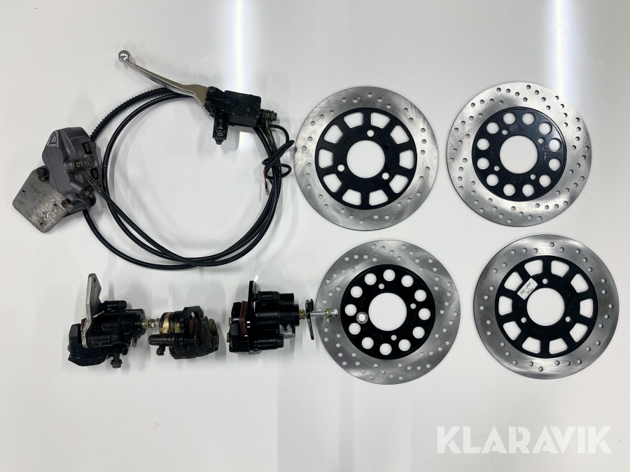Paket med bromsskivor och bromsok