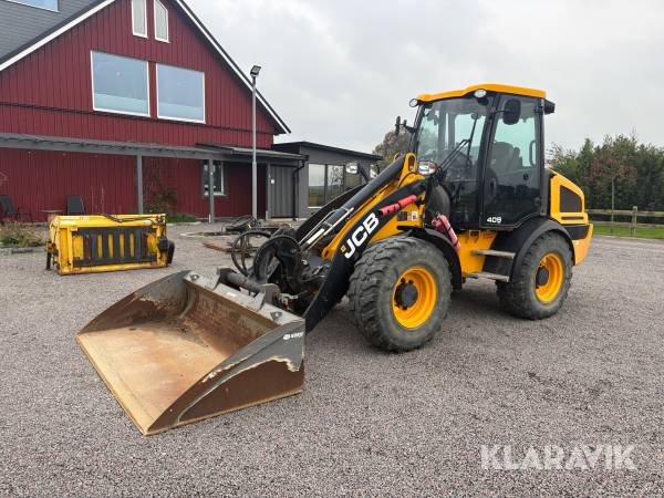 Hjullastare JCB 409 AG T4 med flera redskap