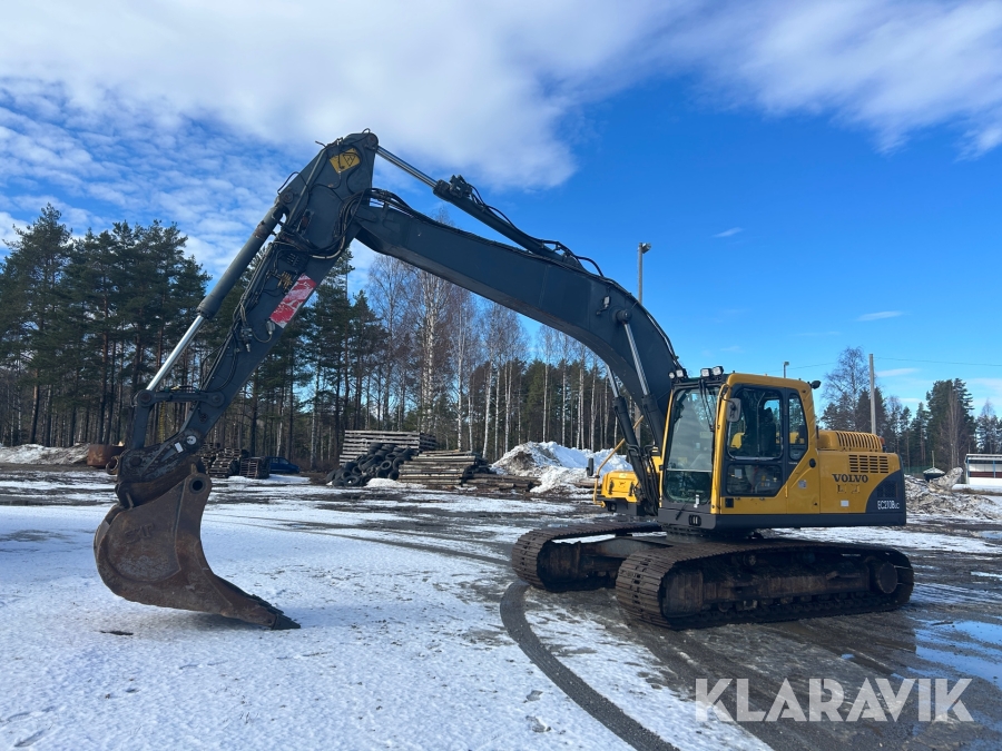 Grävmaskin Volvo EC210B LC med hydraulisk planeringsskopa