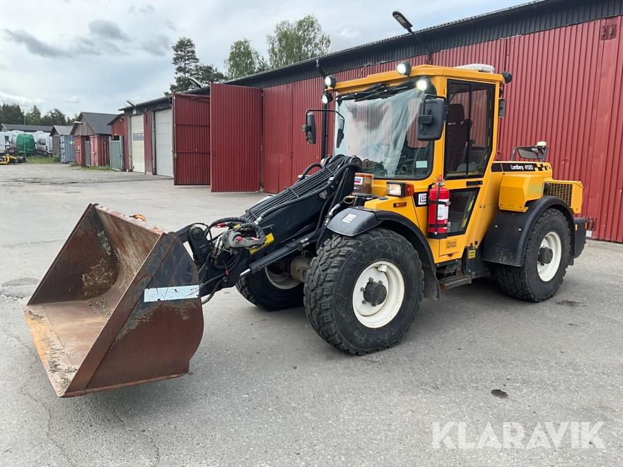 Hjullastare Lundberg 4120 med skopor, vikplog och sandspridare