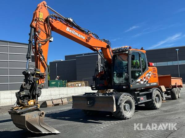 Hjulgrävare Doosan DX165W med 3D grävsystem, tiltrotator, redskap och vagn