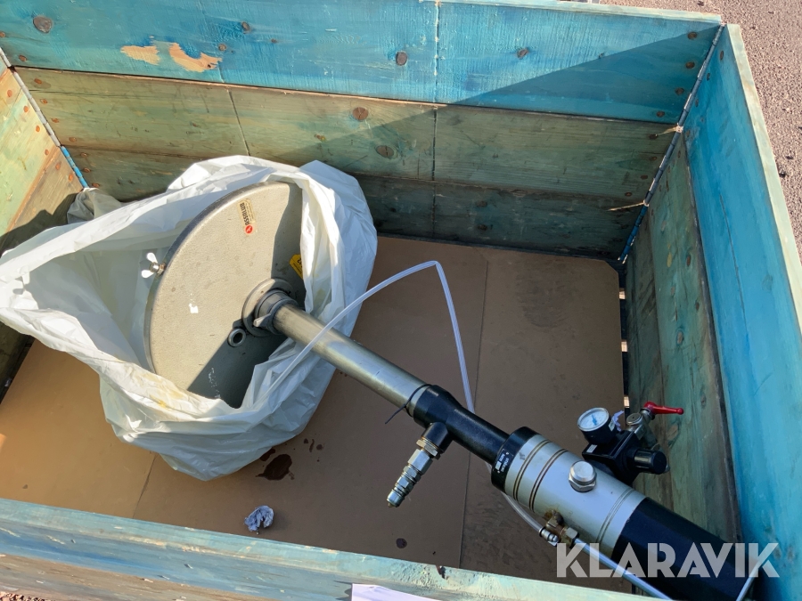 Fettpump med materialställ