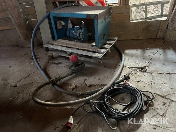 Bevattningssystem med slang, spridare och pump