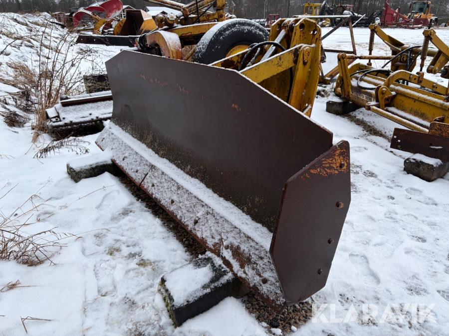 Frontblad för väghyvel