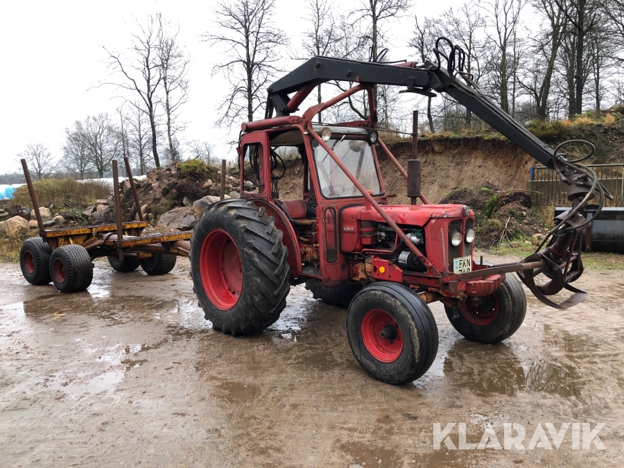 Traktor med kran och skogsvagn BM Volvo 400