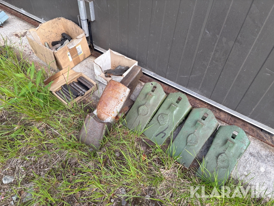 Tänder och låsningar Poclain