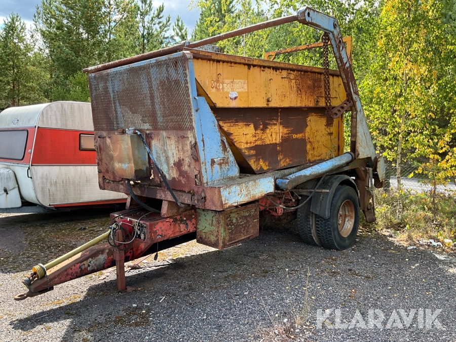 Entreprenadvagn med liftdumper och container