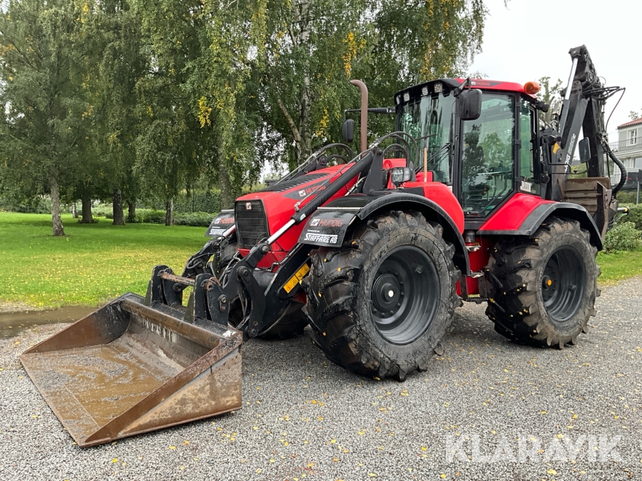 Grävlastare Huddig 1260C med tiltrotator Steelwrist X14 & nya skopor