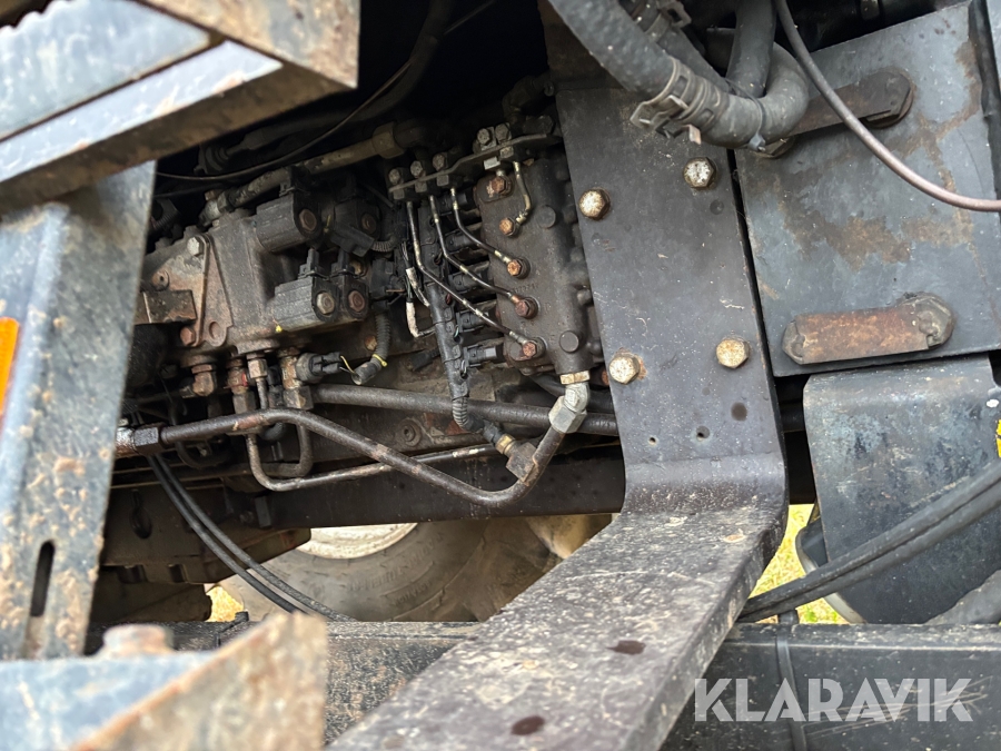 Traktor New Holland M135 4WD med trimalastare