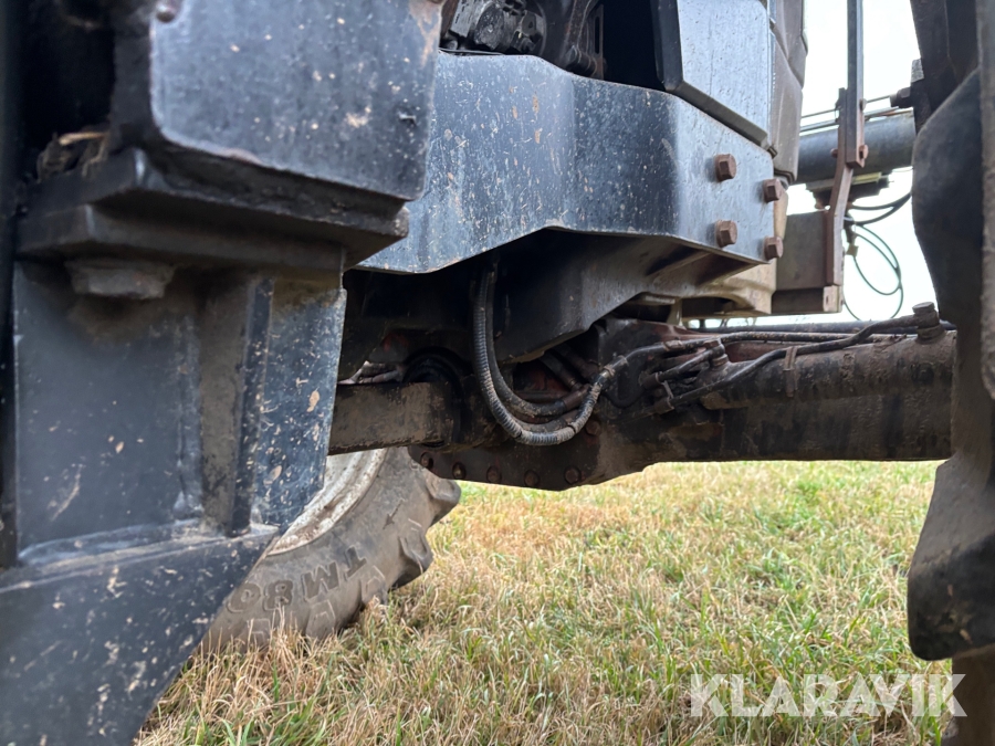 Traktor New Holland M135 4WD med trimalastare