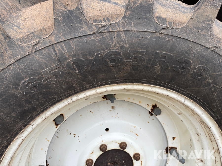 Traktor New Holland M135 4WD med trimalastare