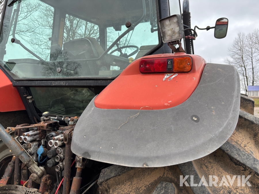 Traktor New Holland M135 4WD med trimalastare