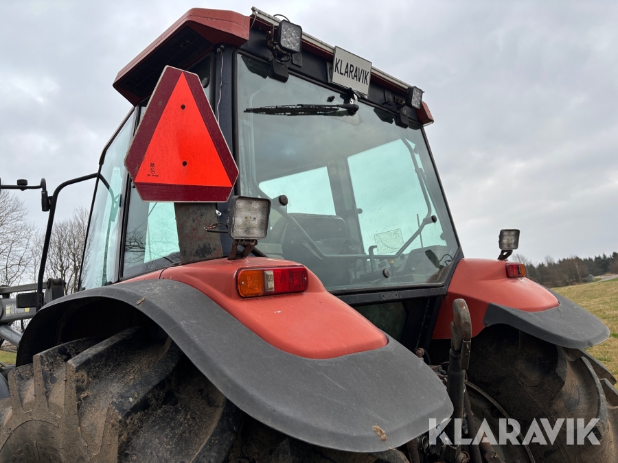 Traktor New Holland M135 4WD med trimalastare