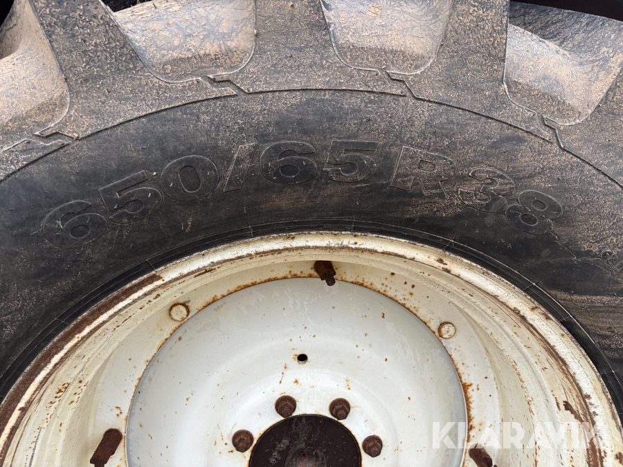 Traktor New Holland M135 4WD med trimalastare