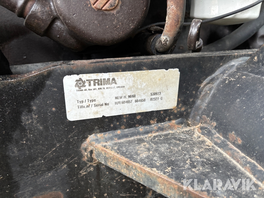 Traktor New Holland M135 4WD med trimalastare