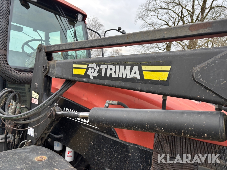 Traktor New Holland M135 4WD med trimalastare