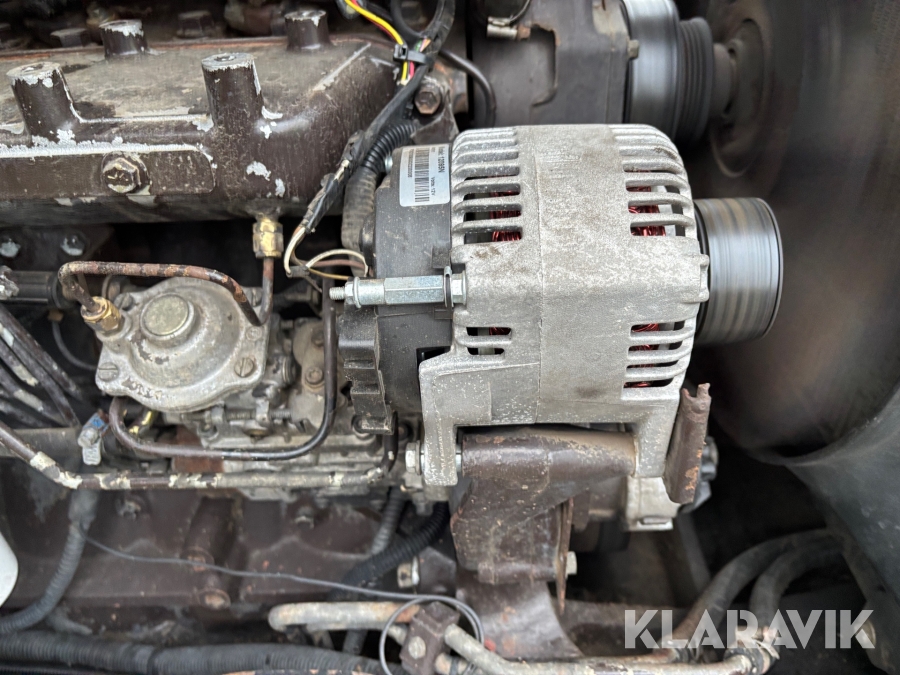 Traktor New Holland M135 4WD med trimalastare