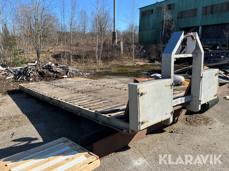 Maskinflak på lastväxlarram