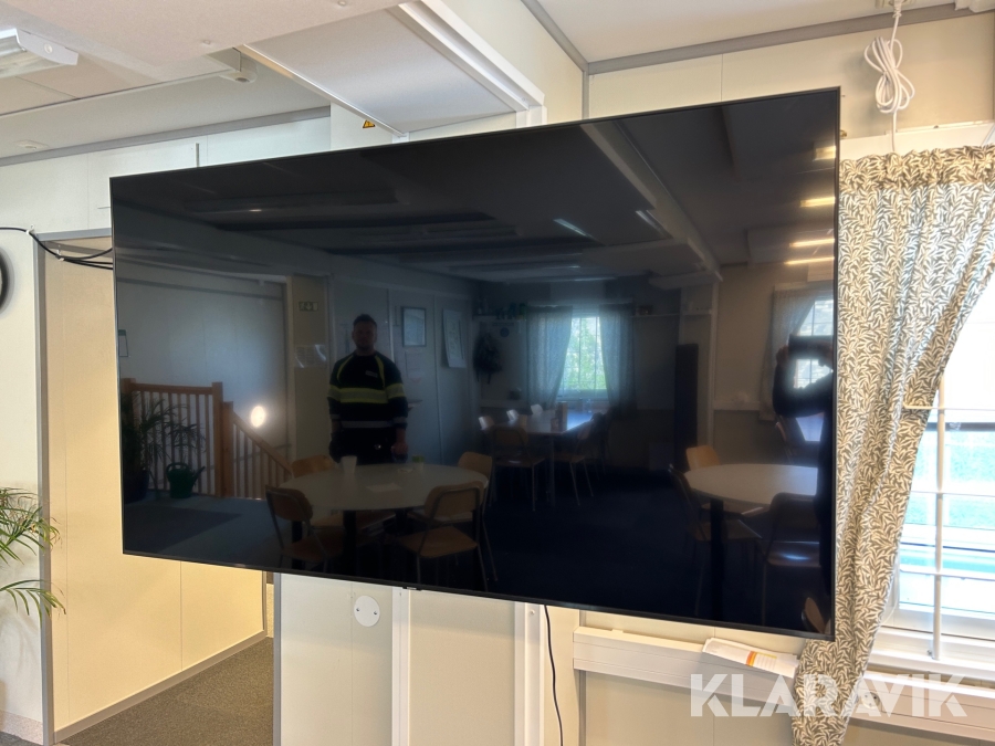 TV Samsung 75 Tum UE75TU6905 på arm