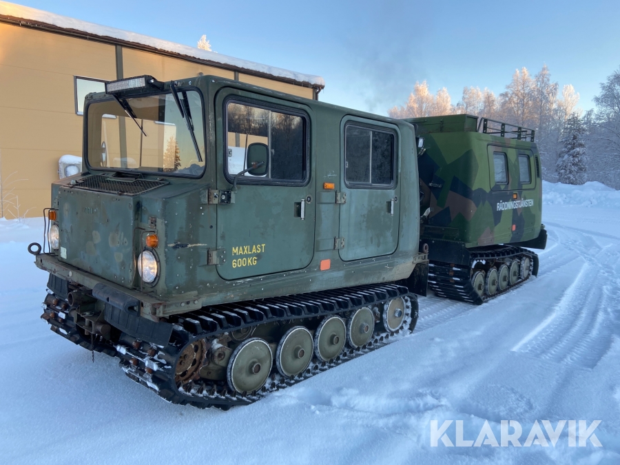 Bandvagn Hägglunds BV 206 med personmodul, flak och lastväxlare