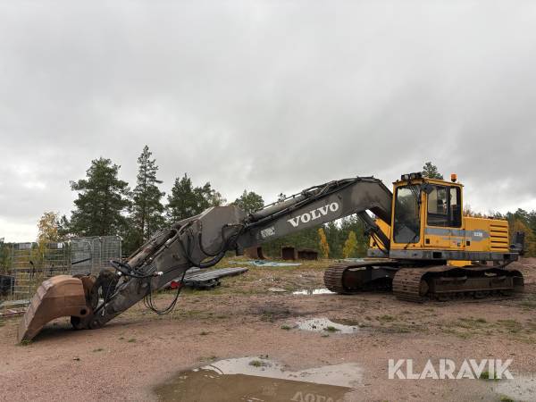 Grävmaskin Volvo EC230B med borrrigg