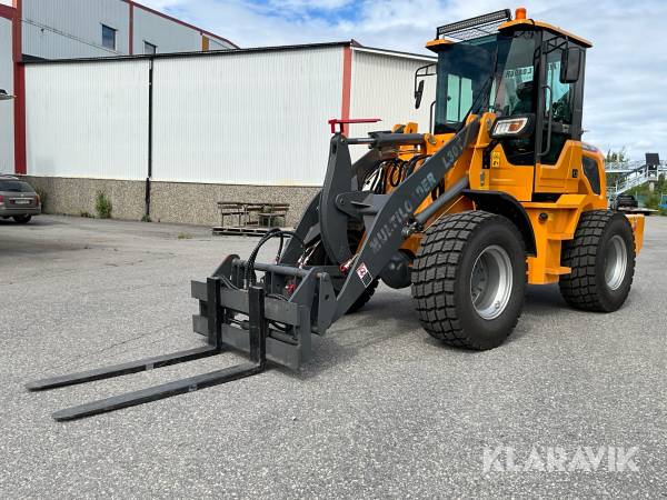 Hjullastare Multiloader L30T med hydrauliska gafflar och skopa