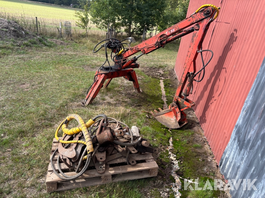 Kombinerat grävaggregat / skogskran